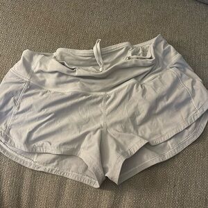 white 2.5” lululemon speed ups size 4